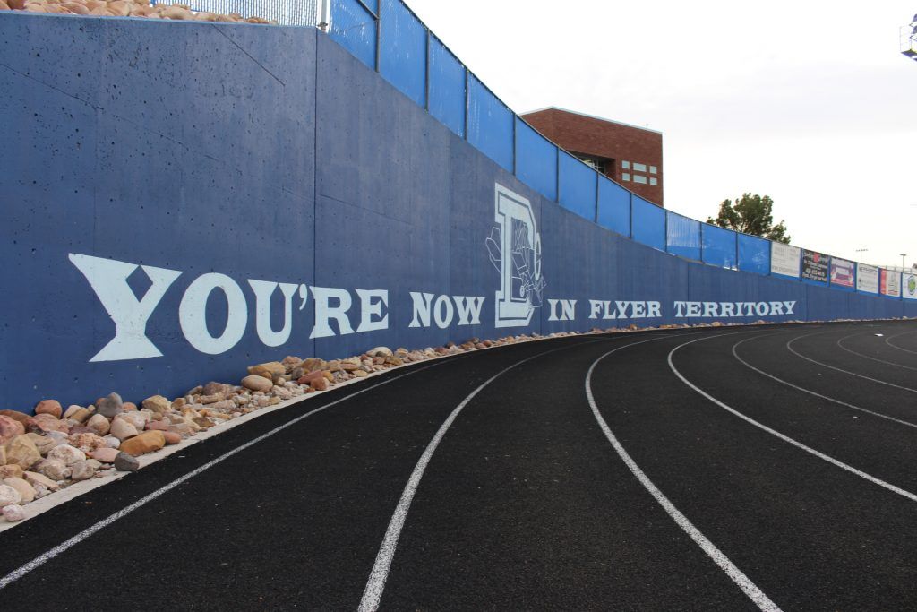 Running track with text of "You're now in flyer territory"