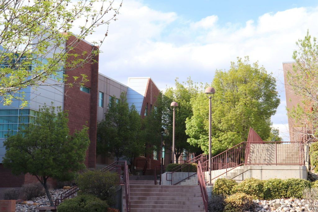 Dixie High building with stairs and trees