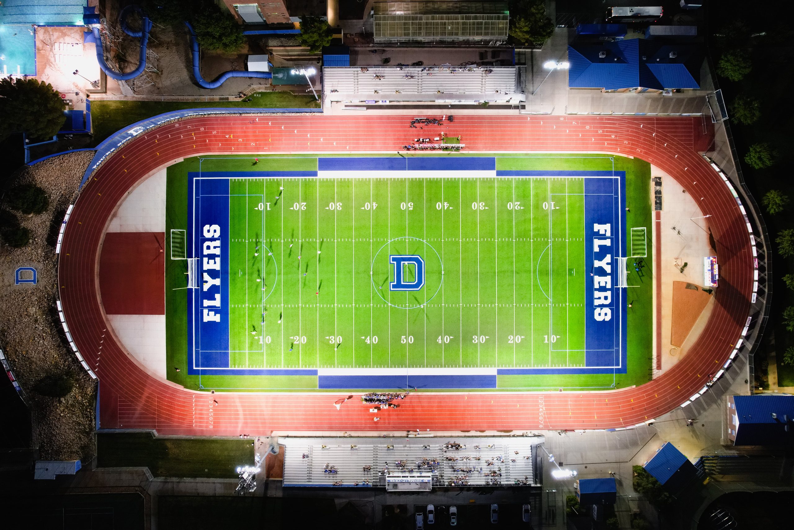 Arial overhead view of the football field at night
